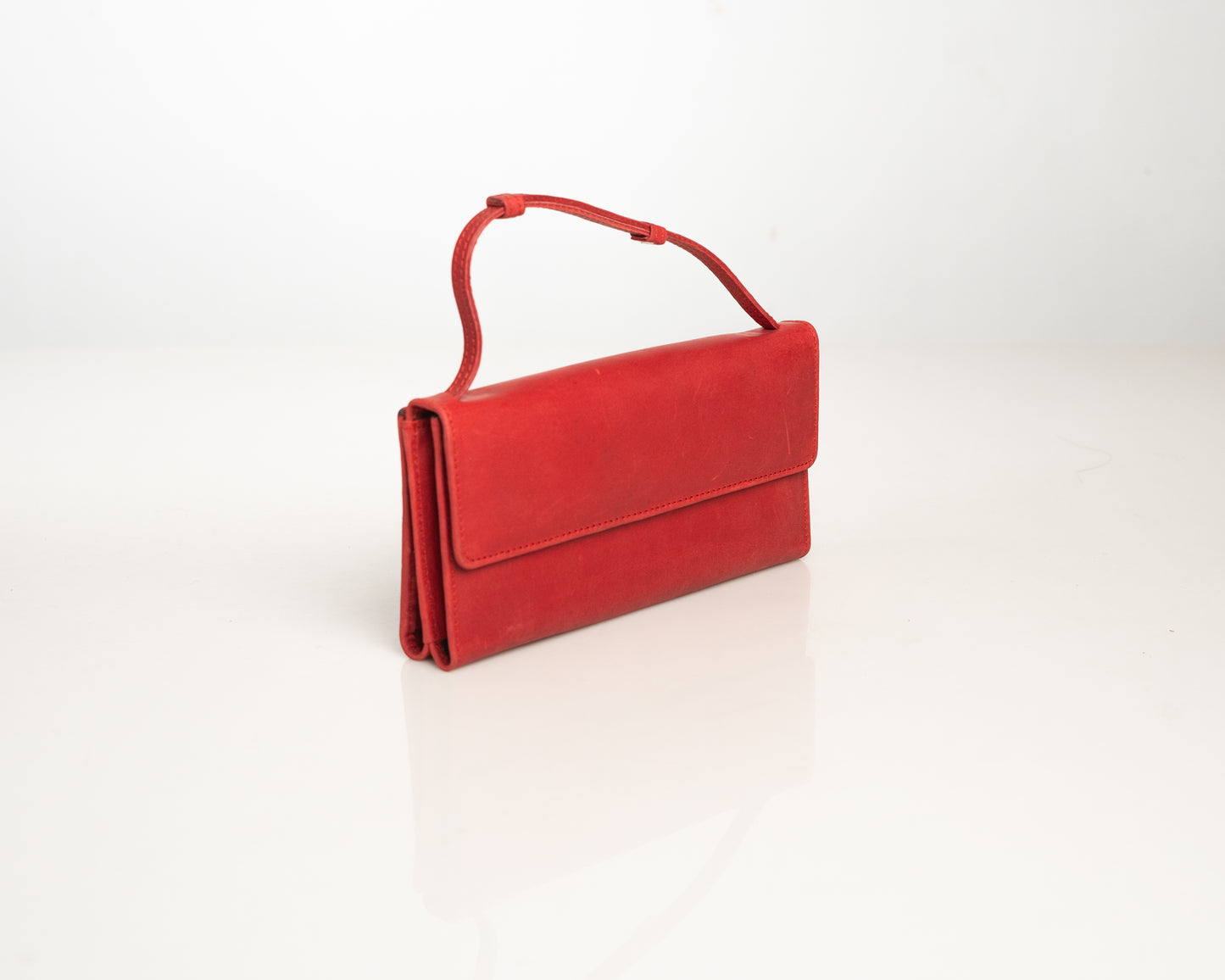 Elegant Red Leather Clutch with Strap – Minimalist Evening Handbag