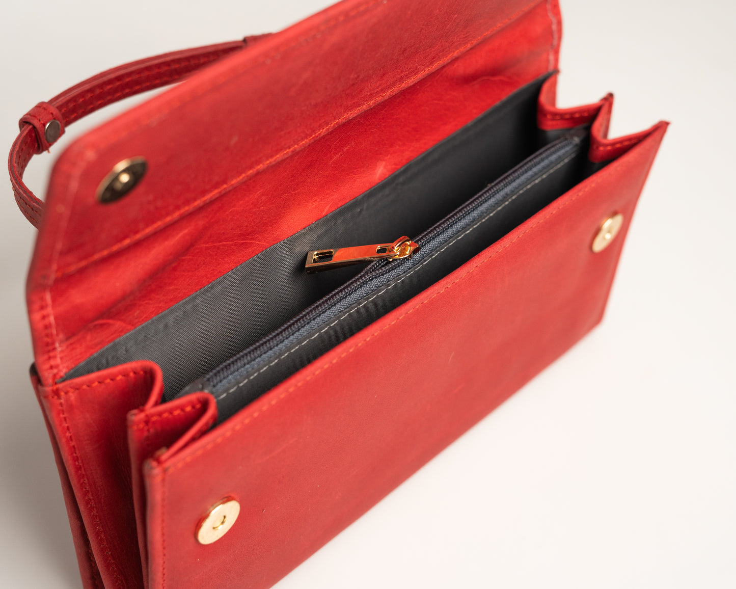 Elegant Red Leather Clutch with Strap – Minimalist Evening Handbag